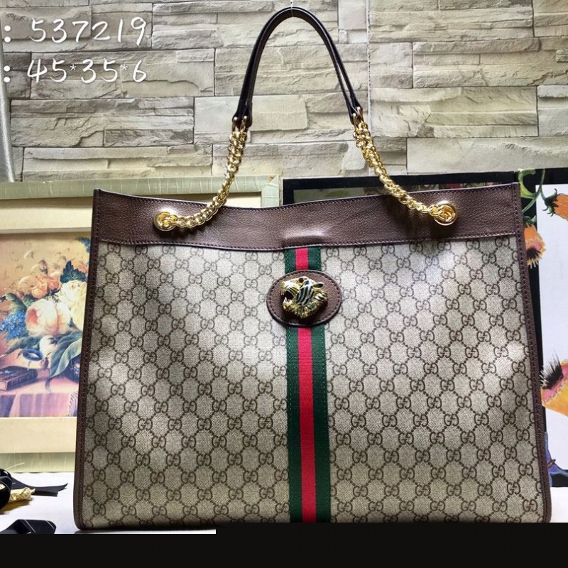 G*u*i shopping bags